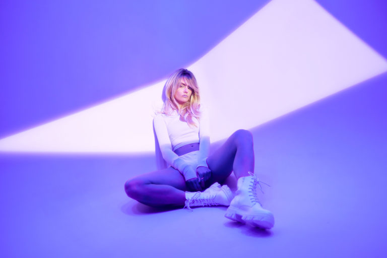 Photographer Jeff Thomas of VERTEX Photography, creates a neon series with model Jen Doehring. The series has an 80's and 90's influence. Both shot on digital and film.